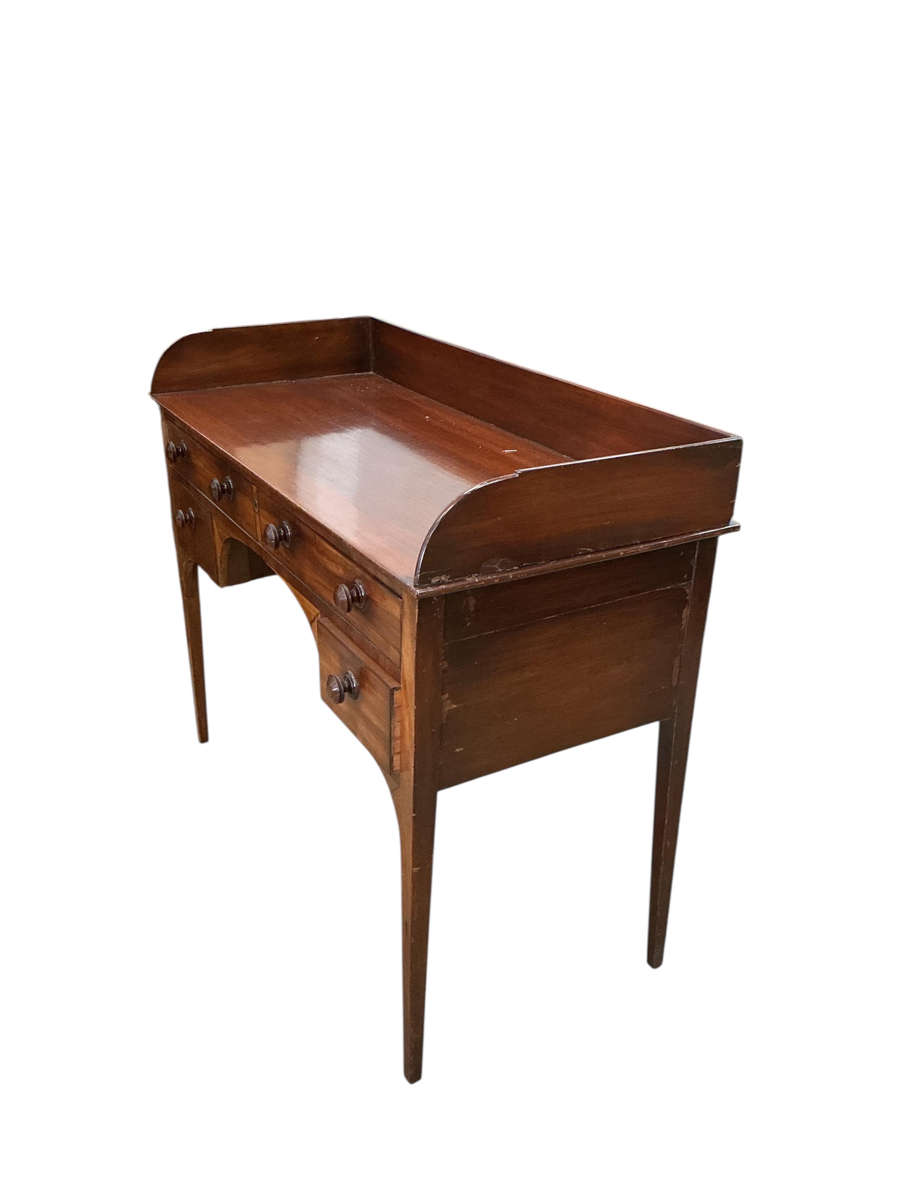 A George III mahogany washstand, width 106cm, depth 48cm, height 88cm